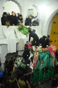 The Ninth Nizam of Hyderabad Nawab Mir Muhammad Azmet Ali Khan, Walashan Azmet Jah Bahadur, presents the traditional Dhatti and Nazrana to the Bibi Ka Alam on 10th day of Moharram (17th July 2024) at Purani Haveli. Scion of the Paigah family and Trustee, Mukarram Jah Trust for Education and Learning Nawab Abul Faiz Khan, Nawab Faiz bin Jung and Charminar MLA Mir Zulfikhar Ali Khan are also seen.