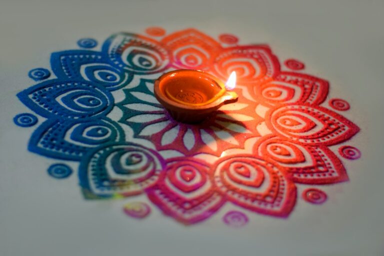 Traditional rangoli decorated for Diwali with festive lights.