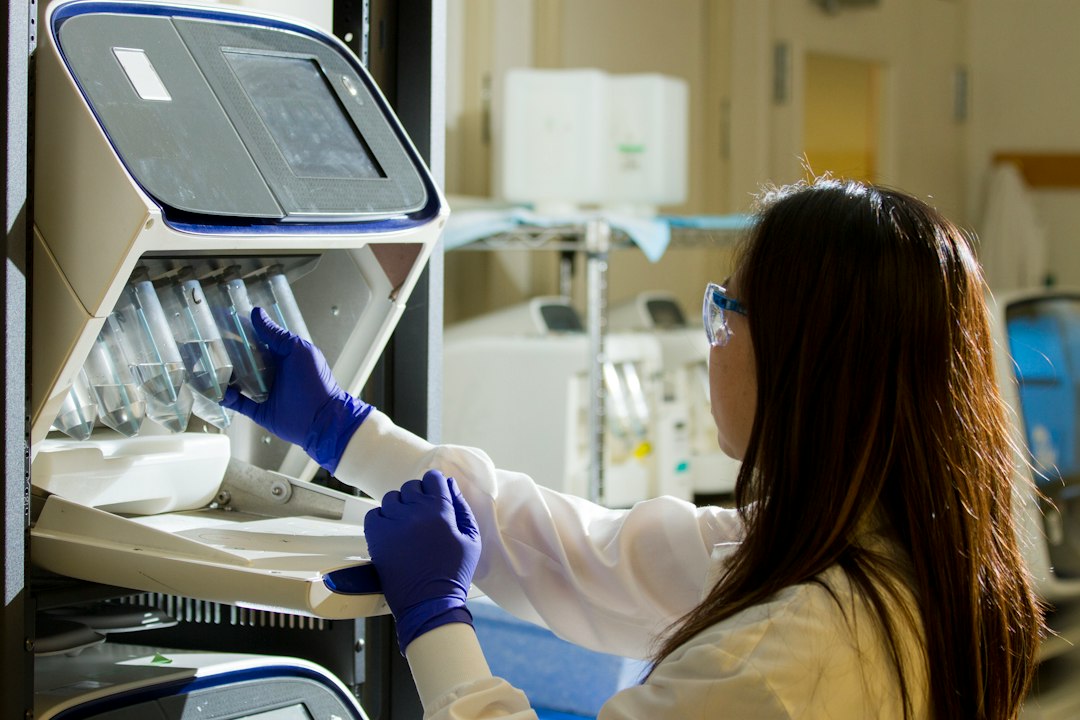 Laboratory scientist working with genomic research data, illustrating AI tools for life sciences research