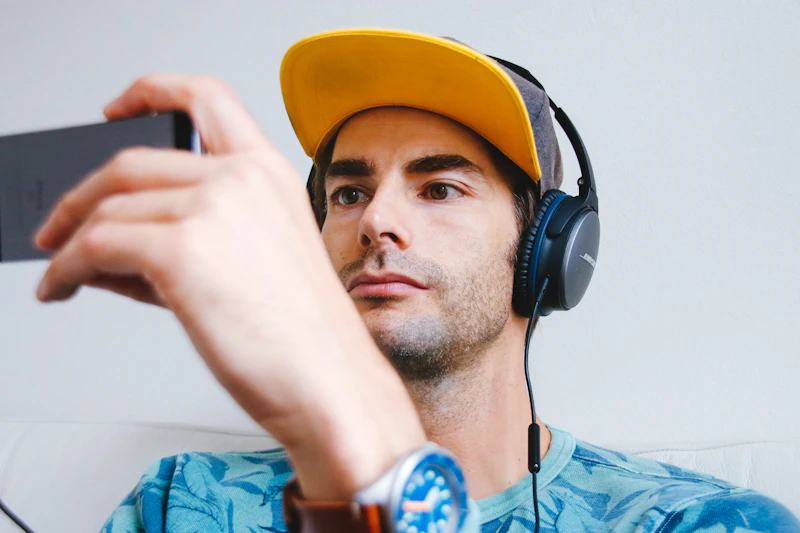 A young person checking content on a smartphone, illustrating how to verify viral videos before sharing