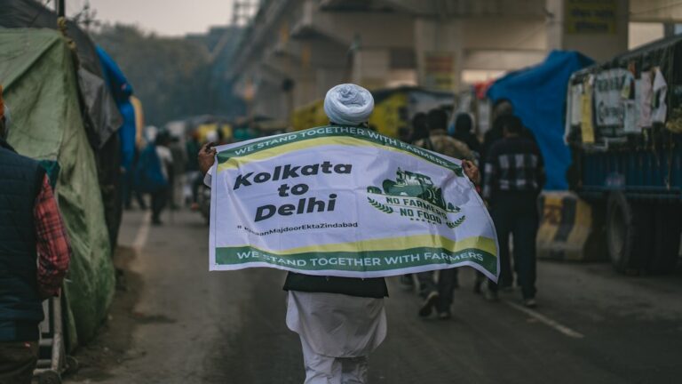 Protesters during a farmers' protest in Delhi; used as an illustrative image for an explainer on India's Election Commission and voter-list controversy.
