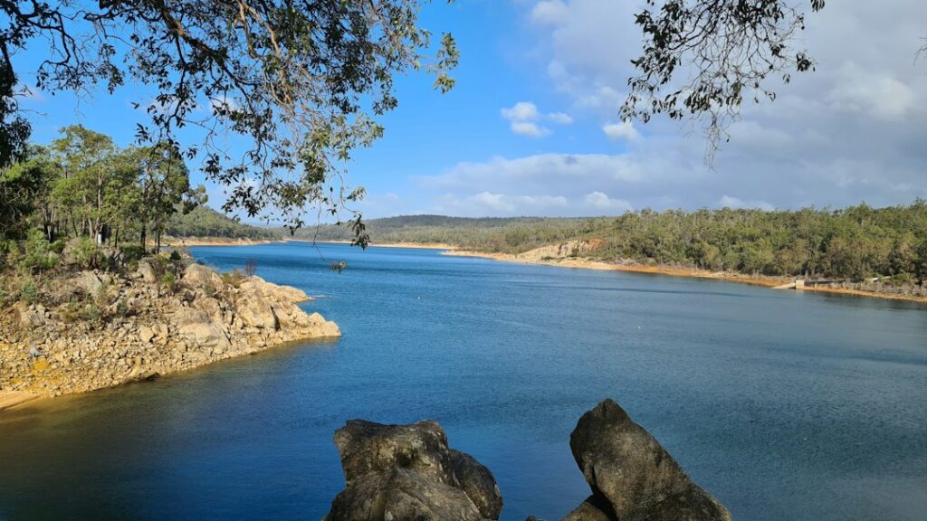 A reservoir and dam landscape illustrating the importance of reliable drinking-water storage