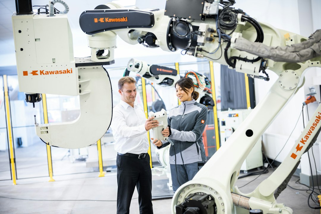 Industrial robotic arm illustrating how robots are becoming co-workers in factories