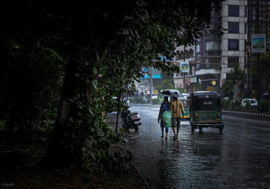 Rain falling over an Indian city during the October transition from the southwest monsoon to the post-monsoon season.