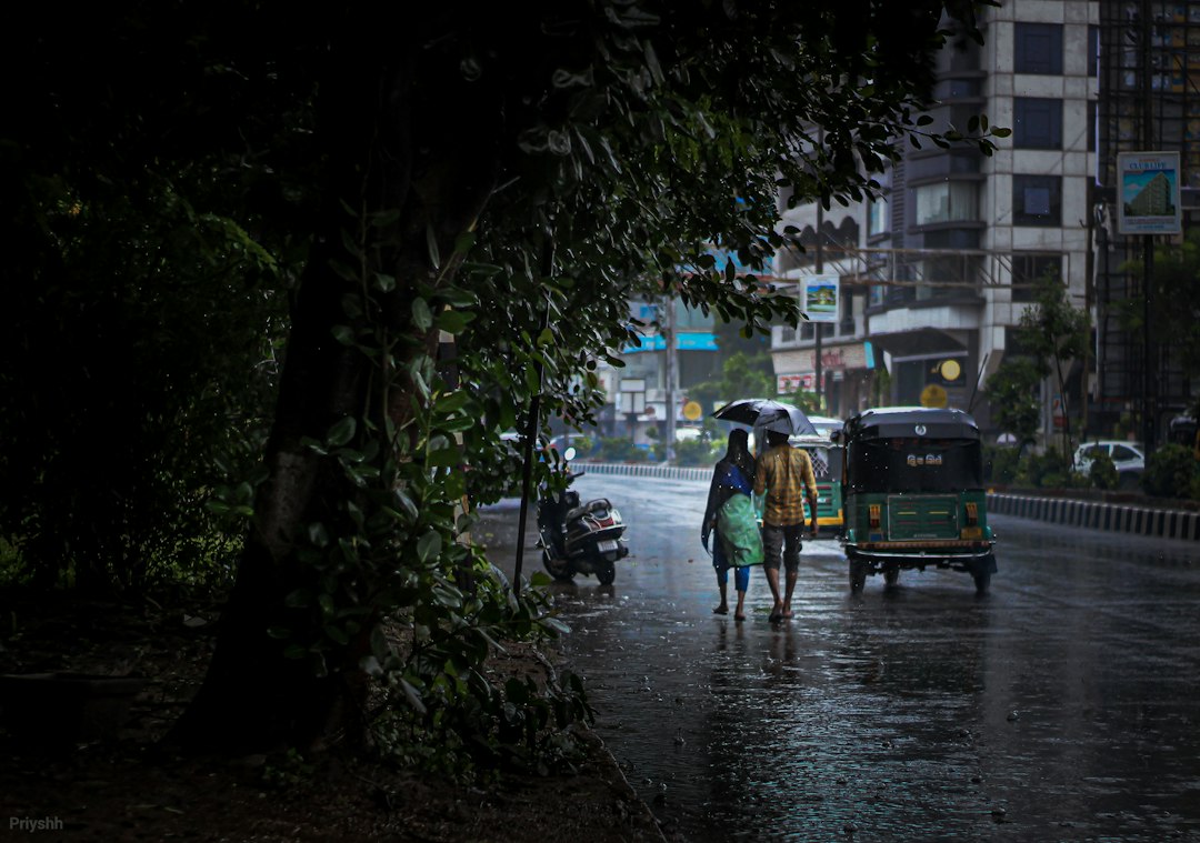 Rain falling over an Indian city during the October transition from the southwest monsoon to the post-monsoon season.